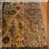 D04. Hand knotted Persian rug with green, gold and red tones. 12'1” x 9' 